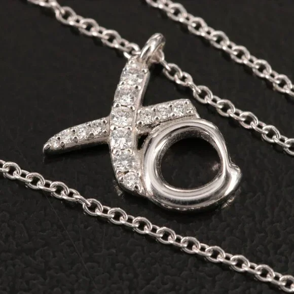Tiffany & Co. 18K White Gold Diamond XO Pendant Necklace - Picture 4 of 10